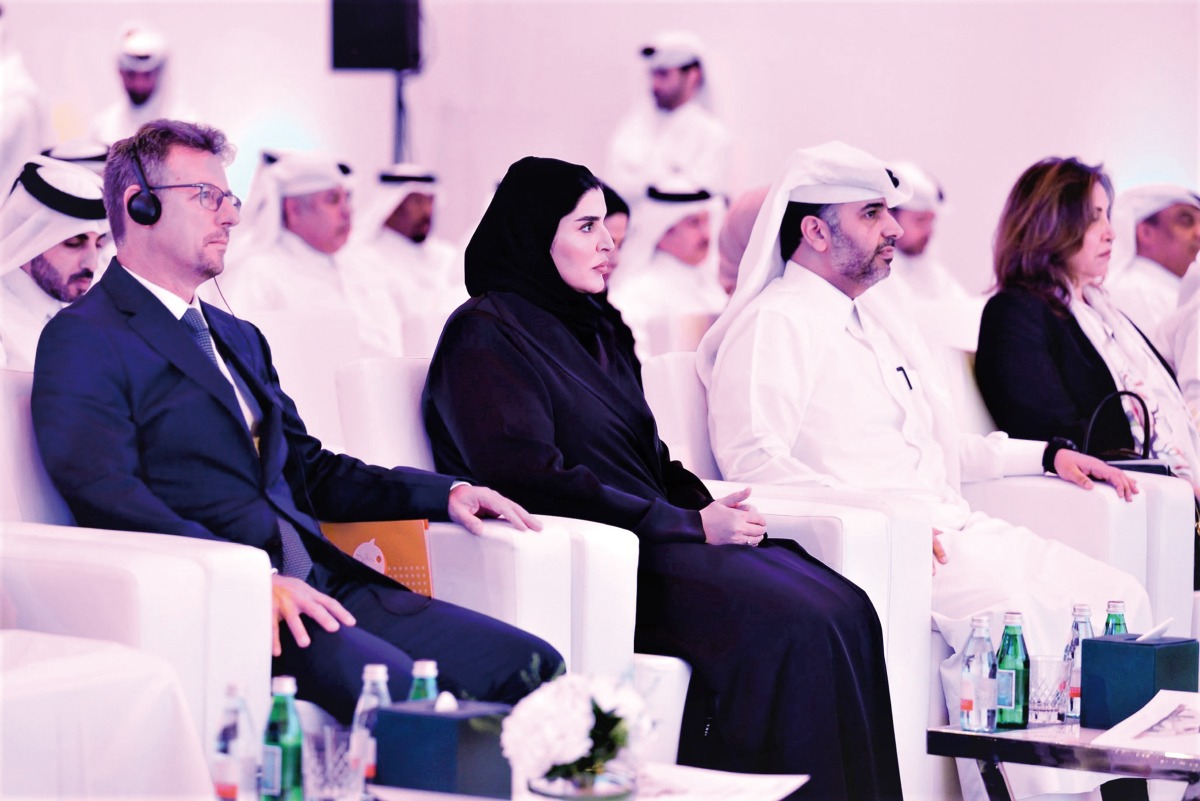 Minister of Social Development and Family H E Maryam bint Ali bin Nasser Al Misnad (second left) and other officials at the event.