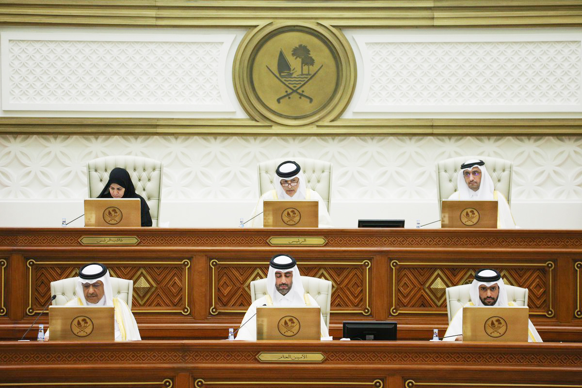 Speaker of the Shura Council H E Hassan bin Abdulla Al Ghanim (top centre) chairing the Shura Council session yesterday. Deputy Speaker H E Dr. Hamda bint Hassan Al Sulaiti (left) and Minister of Justice and Minister of State for Cabinet Affairs H E Ibrahim bin Ali Al Mohannadi (top right) are also seen. 