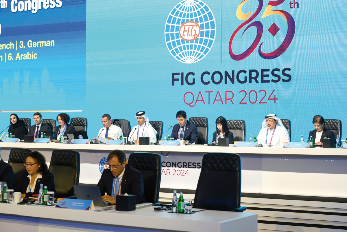 Qatar Olympic Committee Secretary-General Jassim bin Rashid Al Buenain (fourth left), FIG President Morinari Watanabe (centre), and FIG First Vice President and Qatar Gymnastics Federation President Ali Al Hitmi (second right) with other top officials during the opening day of the FIG Congress in Doha, yesterday.