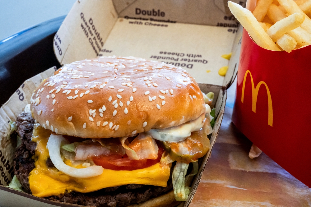 A double quarter pounder with cheese and fries arranged at a McDonald's restaurant in El Sobrante, California, on Oct. 23. Photo credit: David Paul Morris/Bloomberg