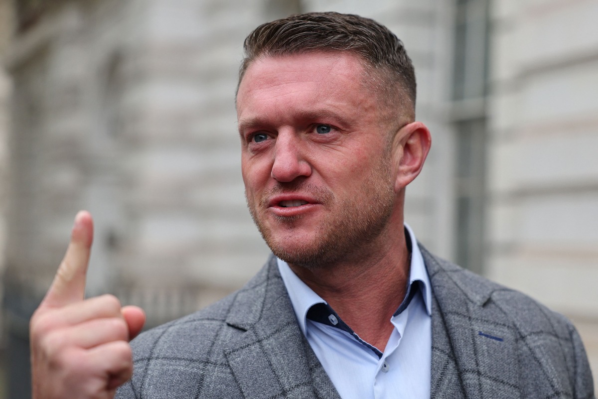 (FILES) Founder and former leader of the anti-Islam English Defence League (EDL), Stephen Yaxley-Lennon, also known as Tommy Robinson, arrives at Westminster Magistrates Court in central London on April 22, 2024, following his arrest at a march against antisemitism in November last year. (Photo by Adrian DENNIS / AFP)
