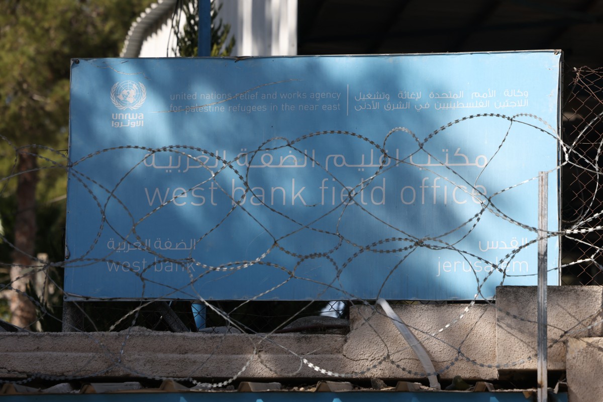 Barbed-wire covers the walls surrounding the UNRWA (United Nations Relief and Works Agency) West Bank Field Office in Jerusalem on October 29, 2024. Photo by AHMAD GHARABLI / AFP.