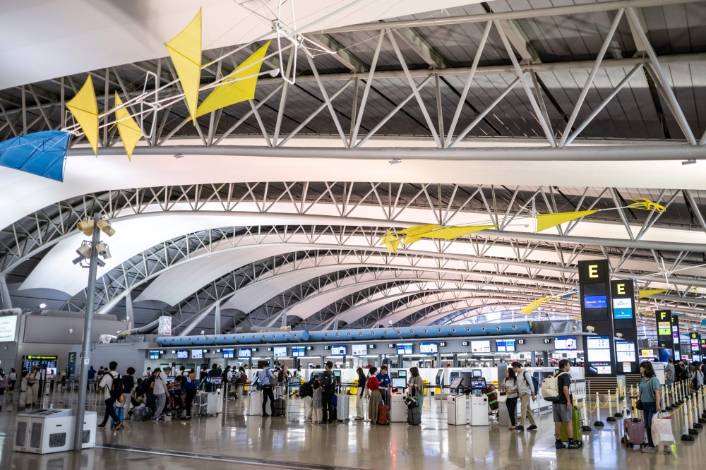 This picture taken on September 3, 2024 shows a general view of the departure hall in Kansai International Airport of Osaka Prefecture. (Photo by Philip Fong / AFP) 