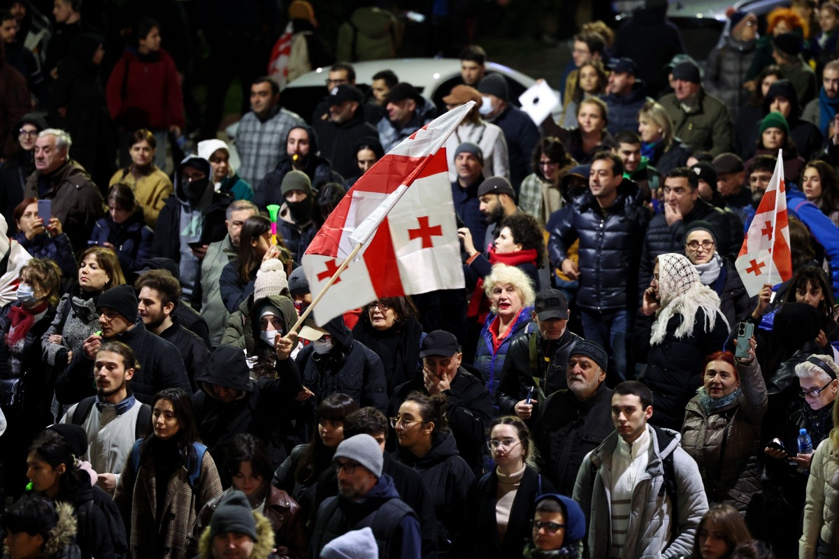 Georgian opposition supporters protest against the results of the last month's parliamentary elections in Tbilisi on November 19, 2024. (Photo by Giorgi ARJEVANIDZE / AFP)


