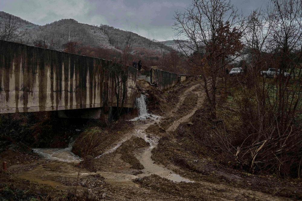 Kosovo Police special unit secures the area near the site of an explosion in the village of Varage, near the town of Zubin Potok, on November 30, 2024. (Photo by Armend Nimani / AFP)