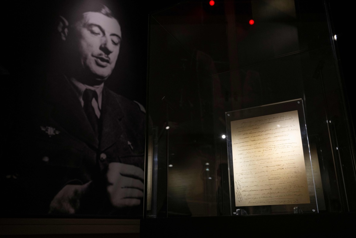 This photograph taken on December 6, 2024, shows a pages from original manuscript of General de Gaulle's 1940 