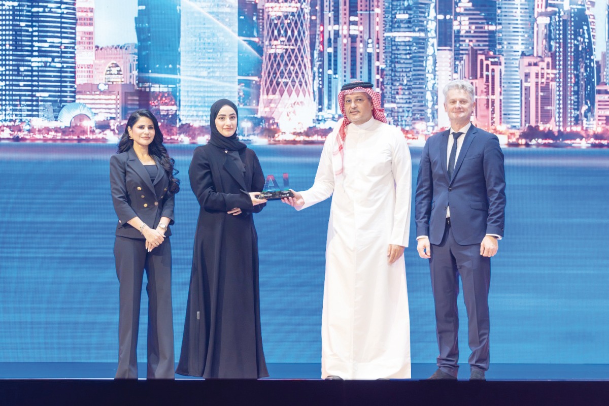 Minister of Communications and Information Technology H E Mohammed bin Ali Al Mannai (second right) and other officials at the award ceremony. 