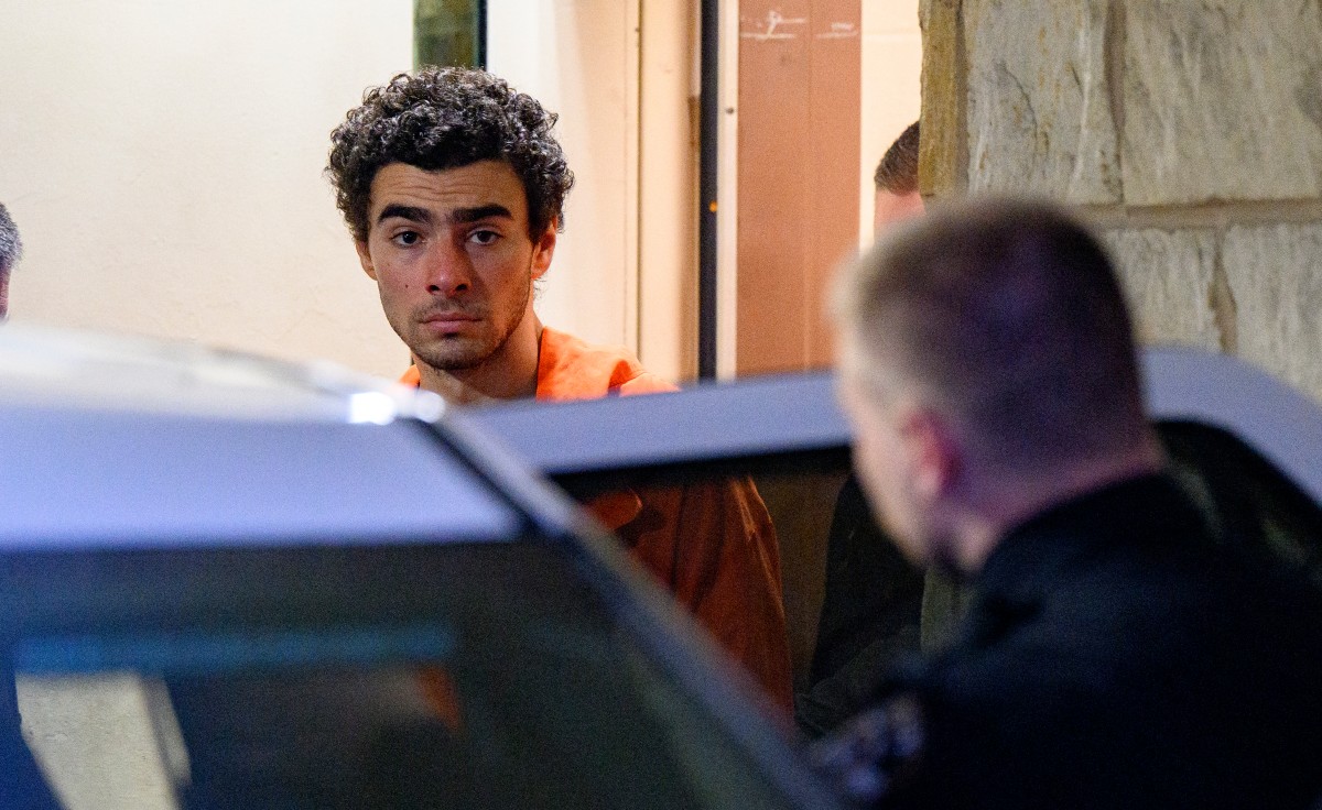 Suspected shooter Luigi Mangione is led from the Blair County Courthouse after an extradition hearing December 10, 2024 in Hollidaysburg, Pennsylvania. Photo by JEFF SWENSEN / GETTY IMAGES NORTH AMERICA / Getty Images via AFP
