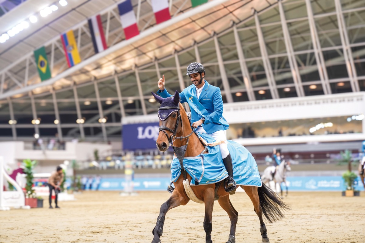 Qatar’s Mohammed Saeed Haidan celebrates after winning the Al Shaqab Champions 130 cm class in the first round of the Al Shaqab League at the Longines Indoor Arena yesterday.