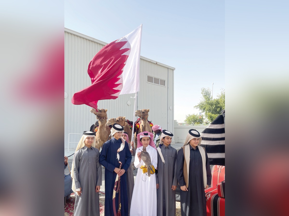 Students at the Qatar National Day celebration.