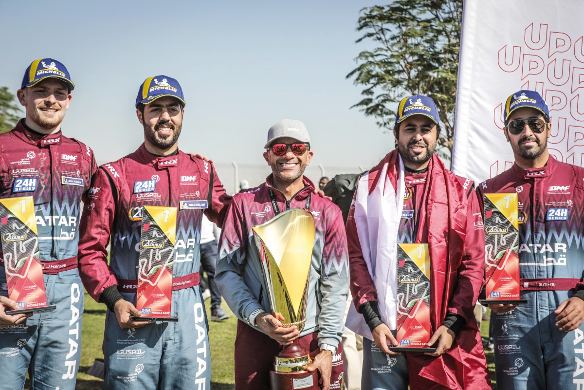 QMMF Executive Director Amro Al Hamad poses with the victorious QMMF By HRT team drivers 