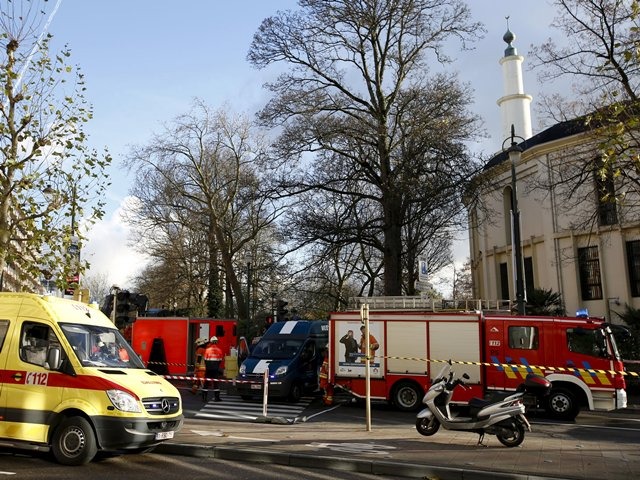 File photo: Belgian firefighters stand outside the Grand Mosque in Brussels, Belgium, November 26, 2015.
