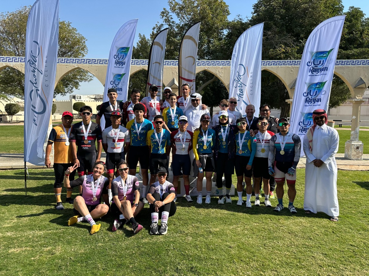 The medal winners pose for a photo with officials.