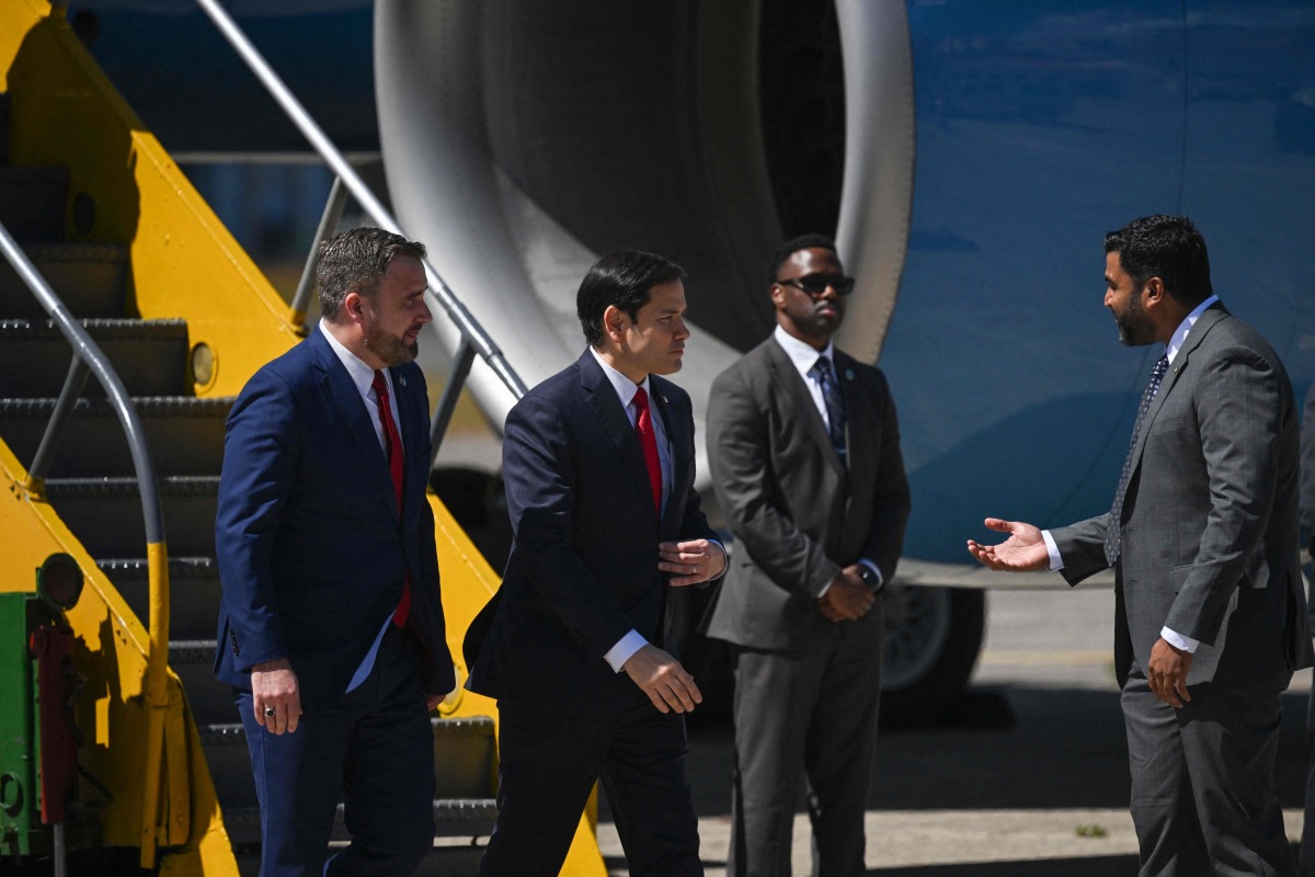 US Secretary of State Marco Rubio (C) arrives at La Aurora International Airport in Guatemala City on February 4, 2025. (Photo by Johan ORDONEZ / Pool AP / AFP)
