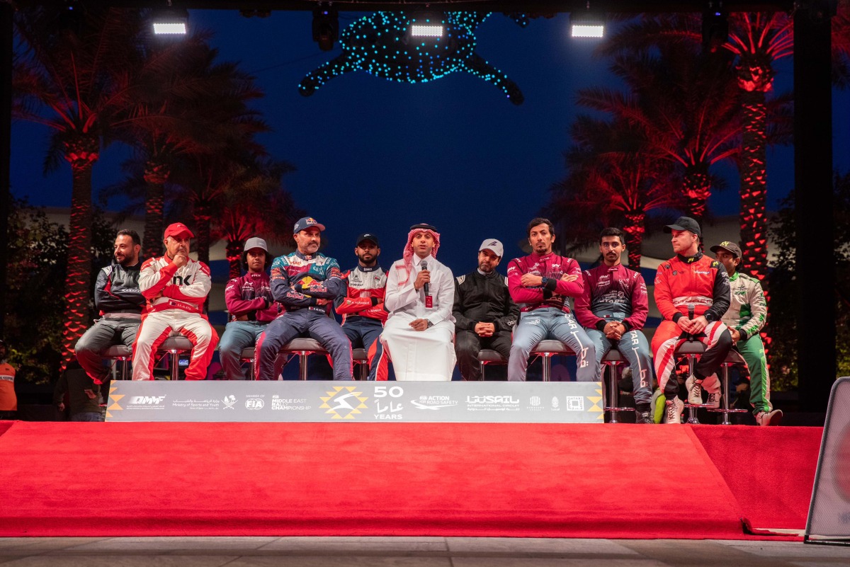 QMMF Executive Director Amro Al Hamad with the leading drivers at the ceremonial start yesterday.