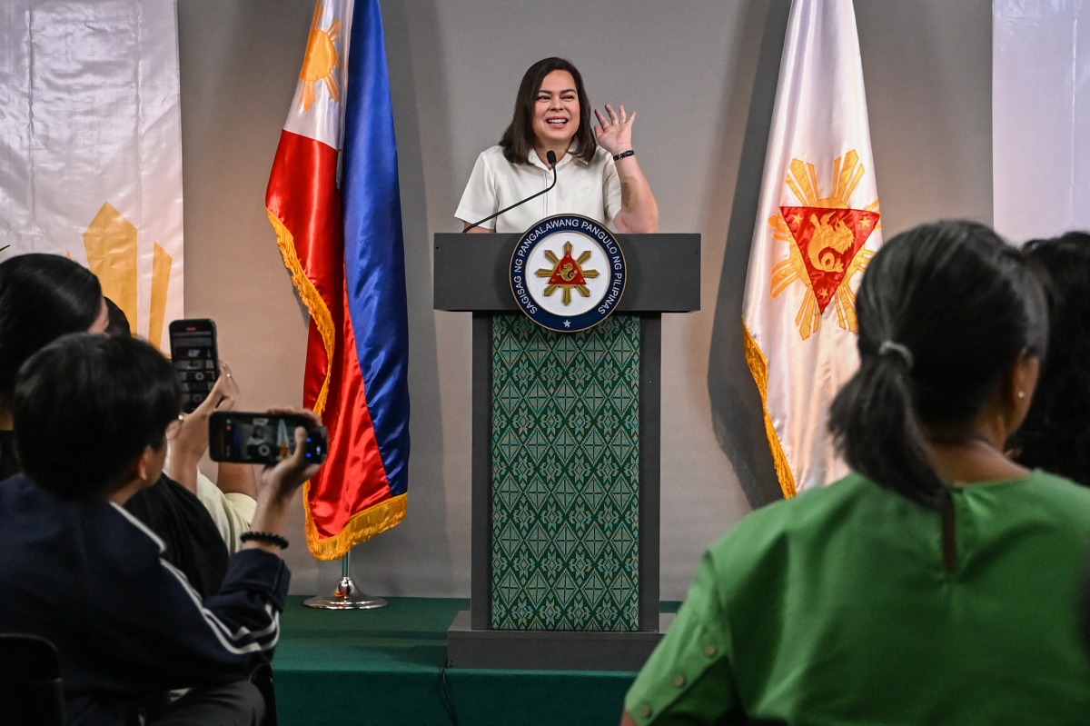 Philippine Vice President Sara Duterte gives a statement on impeachment complaints filed against her at her office in Mandaluyong, Metro Manila on February 7, 2025. (Photo by JAM STA ROSA / AFP)
