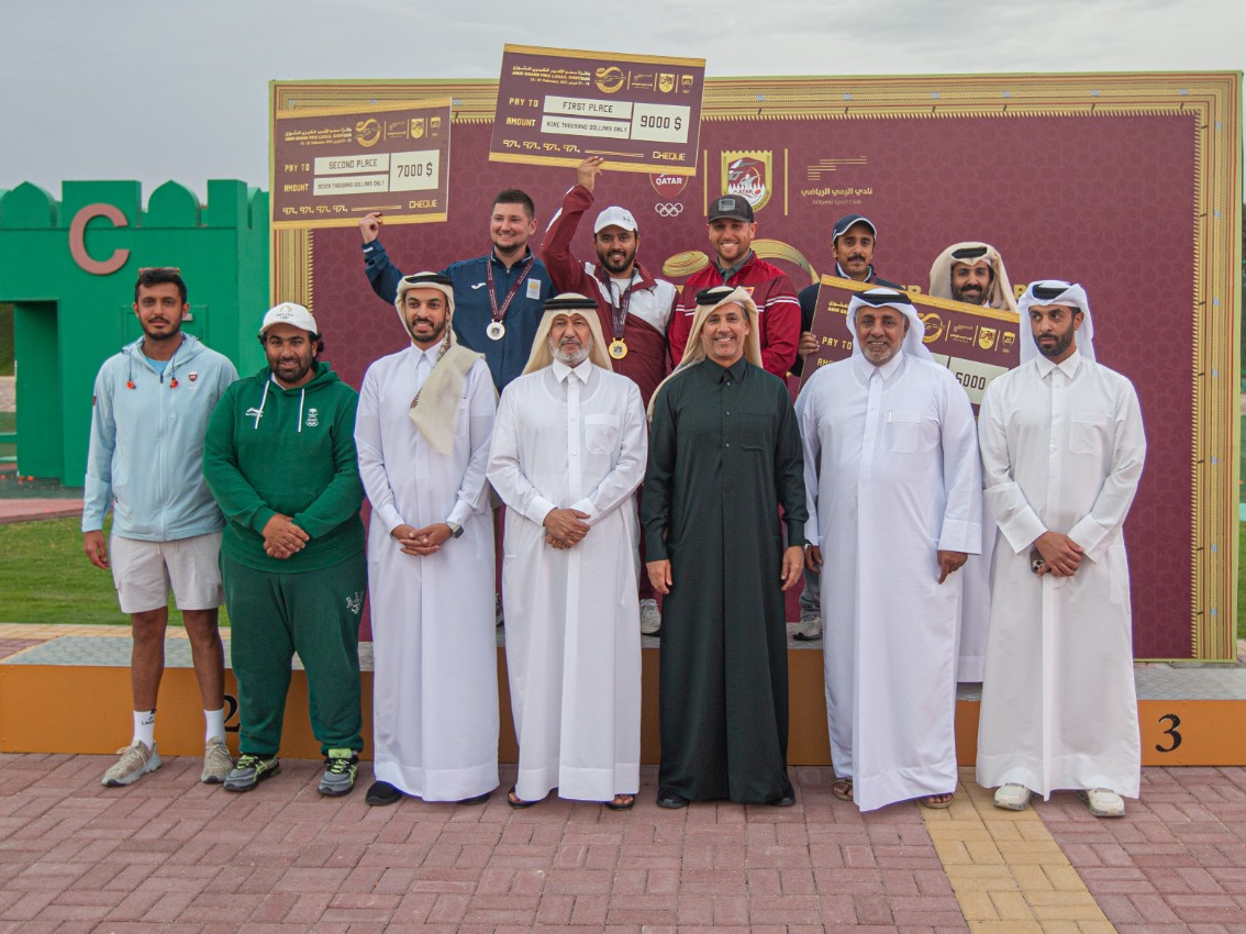 QOC First Vice President Mohammed bin Yousef Al Mana along with other officials and podium winners of men's skeet event. 