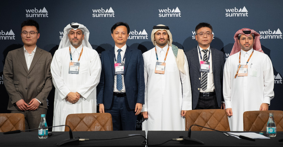 CEO of Invest Qatar, Sheikh Ali Alwaleed Al Thani and Chairman and CEO of Kingdee Group, Robert Xu with other officials during the Web Summit Qatar 2025.