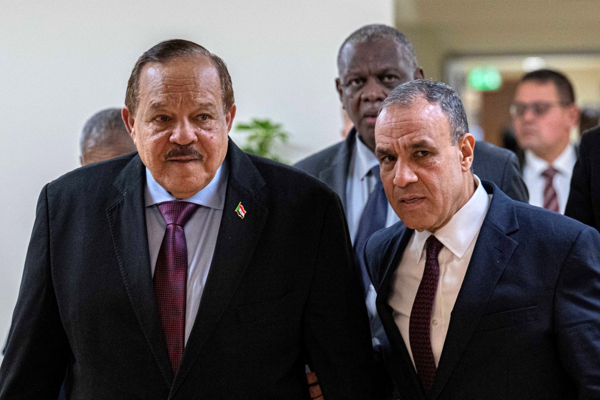 Egypt's Foreign Minister Badr Abdelatty (R) receives Sudan's Foreign Minister Ali Yousuf al-Sharif for a meeting at the New Administrative Capital, about 45 kilometres east of Cairo, on February 23, 2025. (Photo by Khaled DESOUKI / AFP)
