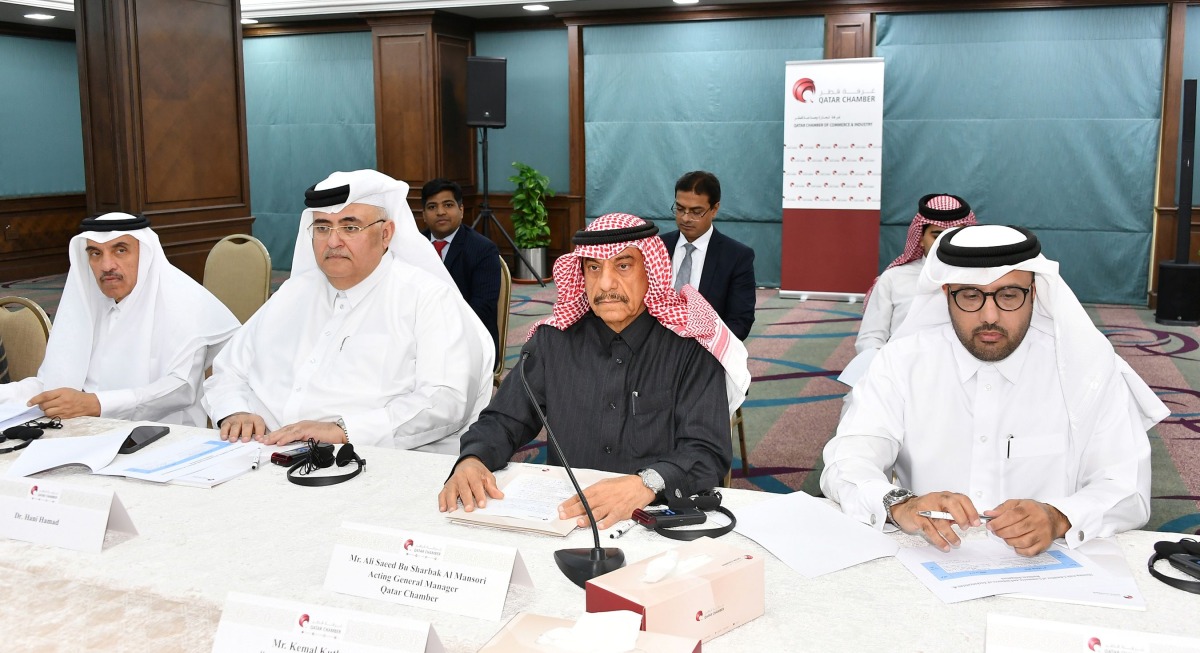 QC Acting General Manager, Ali Saeed Bu Sharbak Al Mansouri with other officials during the meeting.