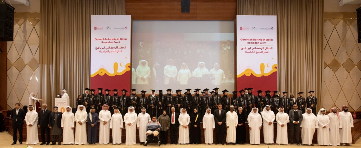 EAA Foundation and Awqaf officials with graduates during the graduation and Ghabga event held in Doha recently.