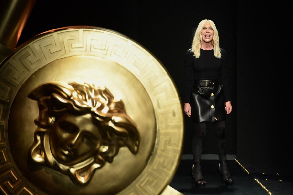 Fashion designer Donatella Versace acknowledges applause following the Versace women's Fall/Winter 2019/2020 collection fashion show, on February 22, 2019 in Milan. Photo by Miguel MEDINA / AFP