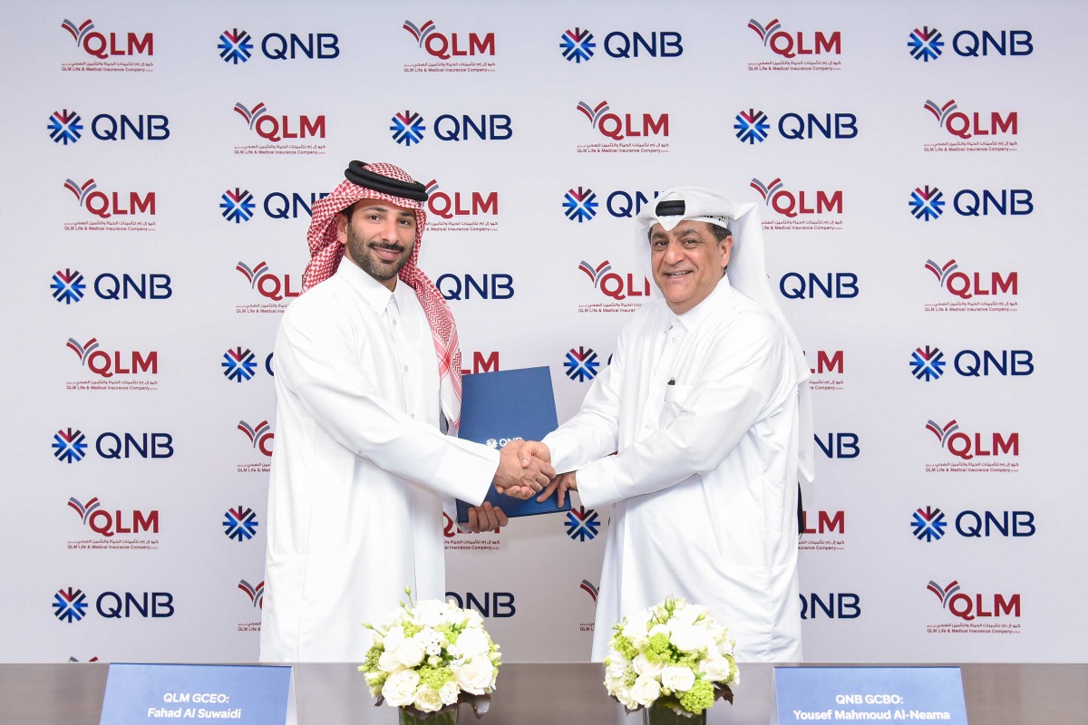 Group Chief Business Officer at QNB, Yousef Mahmoud Al Naema with Chief Executive Officer, QLM Life & Medical Insurance Company, Fahad Al Suwaidi.