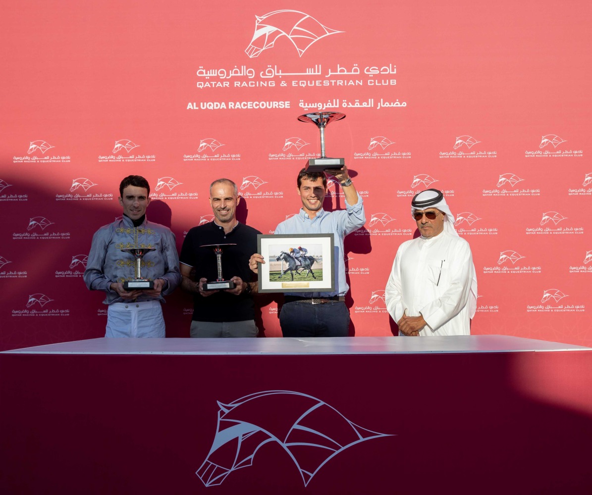 Qatar Racing and Equestrian Club's Racing Manager Abdulla Rashid Al Kubaisi presented the trophies to the winners of the Msheireb Cup. Pictures: JUHAIM/QREC