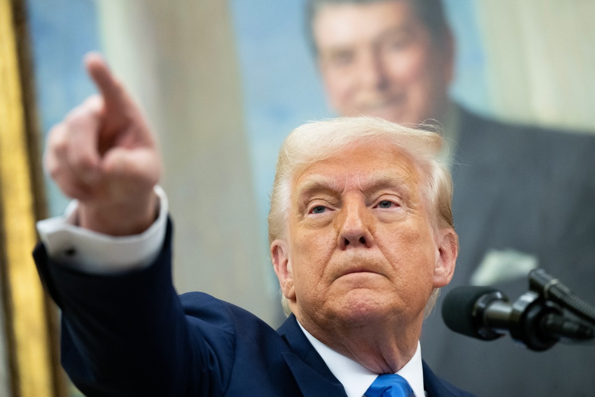 US President Donald Trump speaks during a swearing in ceremony for Alina Habba as US Attorney General for New Jersey, in the Oval Office of the White House in Washington, DC, on March 28, 2025. Photo by SAUL LOEB / AFP.