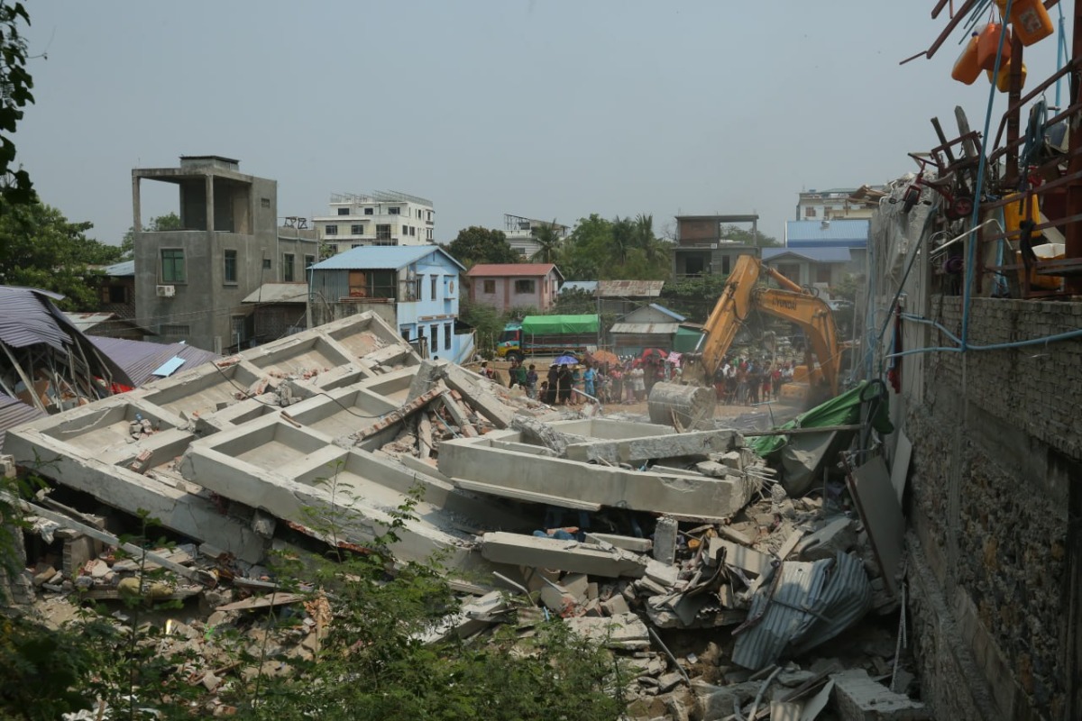 This photo shows rescue operations underway in Mandalay, Myanmar, March 29, 2025. (Photo by Kyaw Zin Tun/Xinhua)
