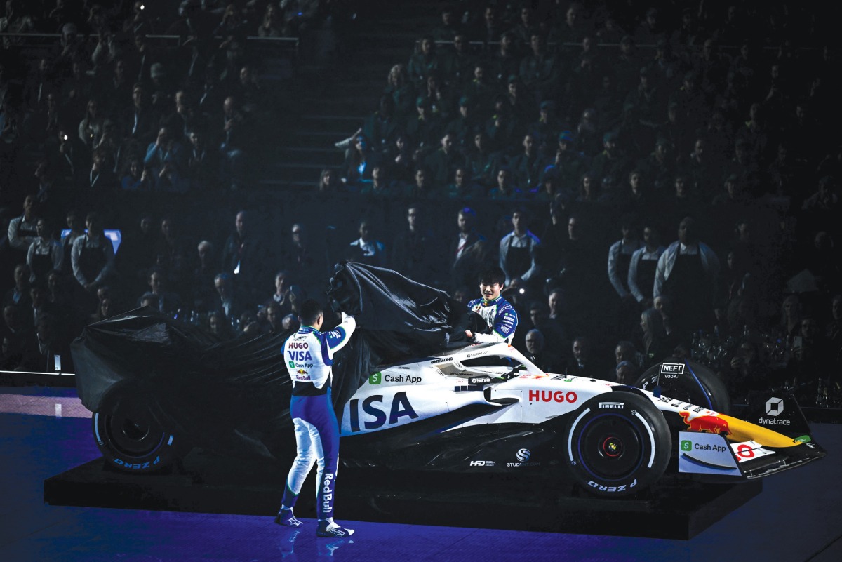 Racing Bulls’ French driver Isack Hadjar (left) and Racing Bulls’ Japanese driver Yuki Tsunoda (rear) during the Formula One - 2025 season launch event, in this February 18 file photo.