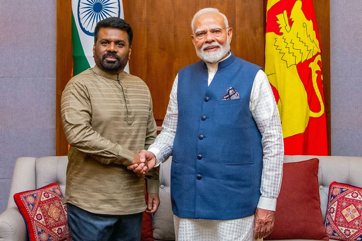 In this handout photograph taken on April 5, 2025 and released by Sri Lanka's President office, Sri Lanka's President Anura Kumara Dissanayake (L) shakes hands with India's Prime Minister Narendra Modi after a bilateral meeting at the president's office in Colombo. (Photo by Sri Lanka's President Office / AFP) 