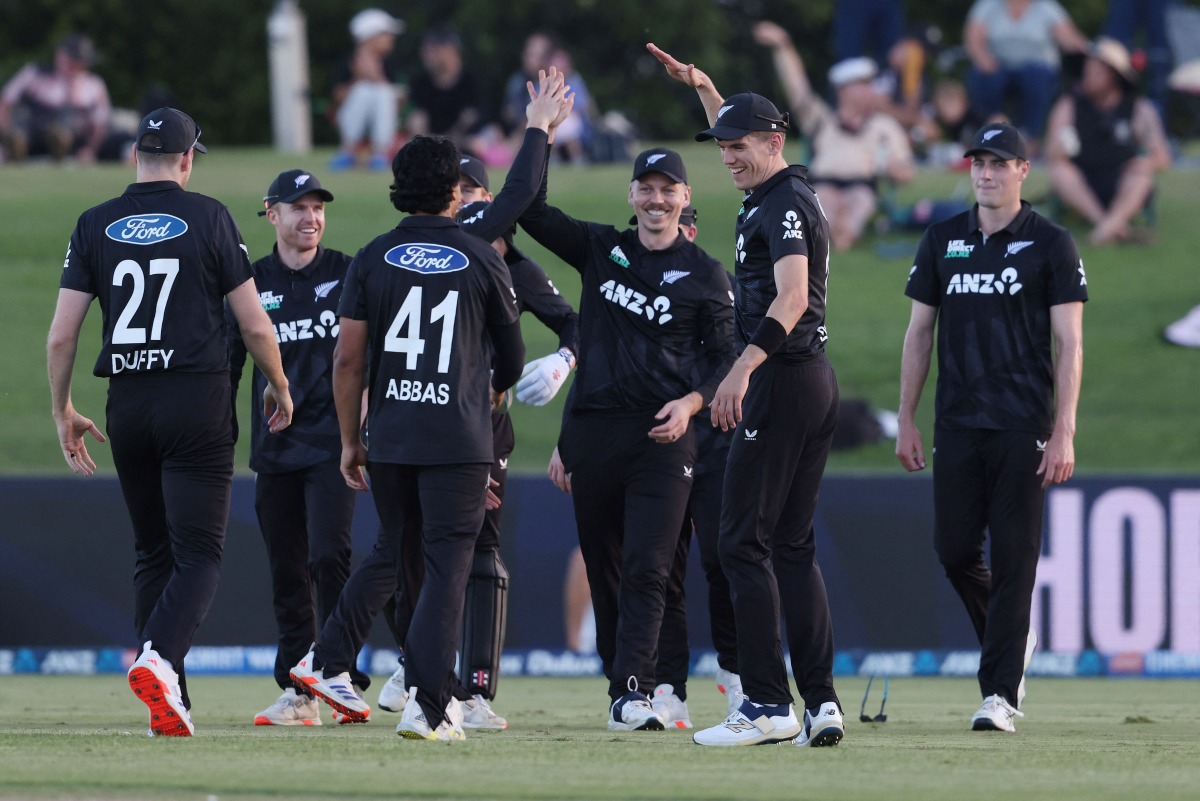 New Zealand players celebrate the wicket of Pakistan Usman Khan during the third one day international (ODI) cricket match between New Zealand and Pakistan at Bay Oval in Mount Maunganui on April 5, 2025. (Photo by Michael Bradley / AFP)
