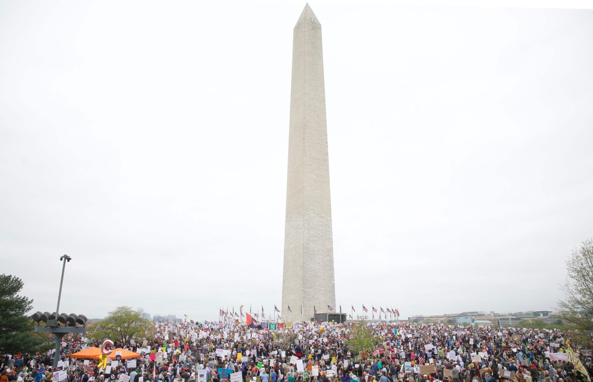 Demonstrators gather on the National Mall for the nationwide 
