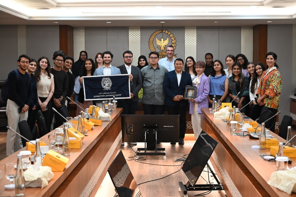 GU-Q students with officials during their visit to Indonesia.