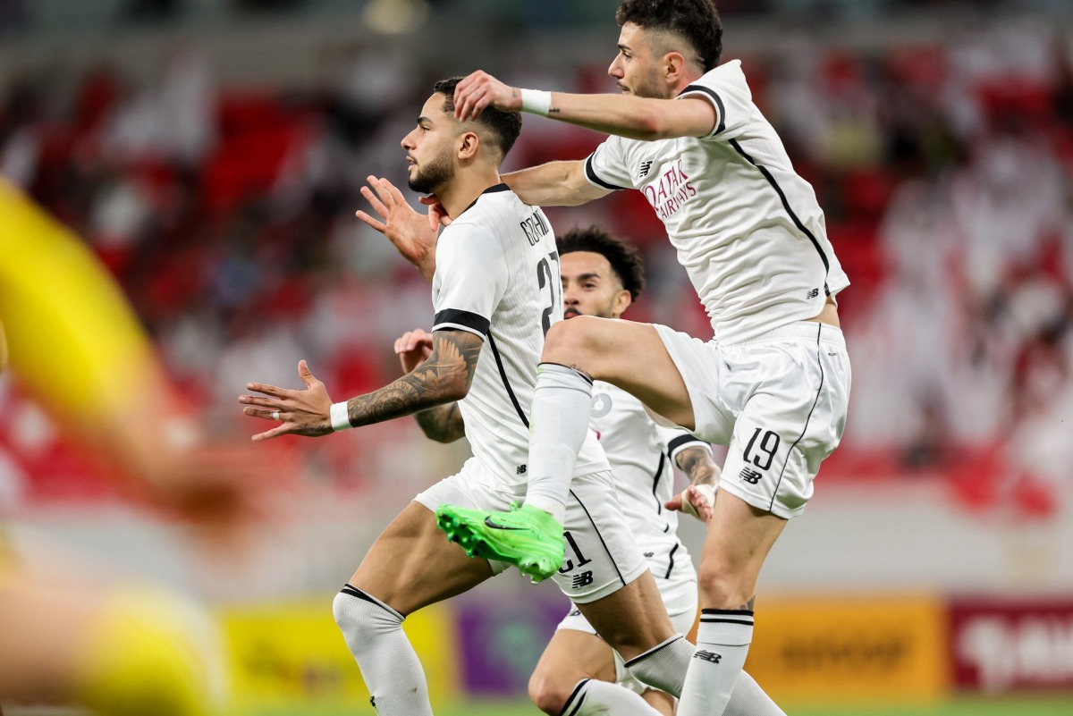 Al Sadd players celebrate during the match against Al Rayyan. 