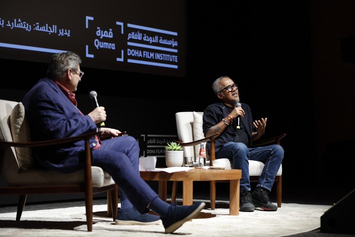 Lav Diaz (right) speaking at his Masterclass at Qumra.