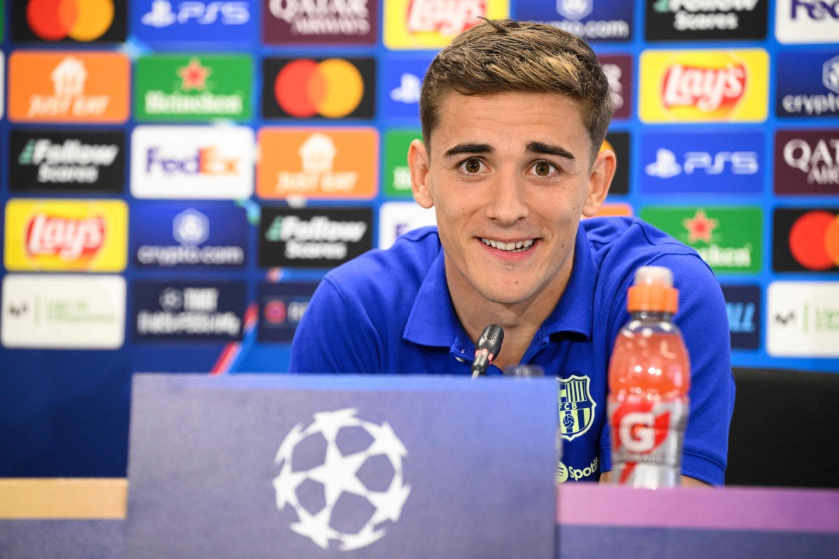 Barcelona's Spanish midfielder Pablo Gavi smiles during a press conference on the eve of the UEFA Champions League quarter final first leg football match between Barcelona and Borussia Dortmund at the Joan Gamper training ground in Sant Joan Despi, near Barcelona, on April 8, 2025. (Photo by Josep LAGO / AFP)