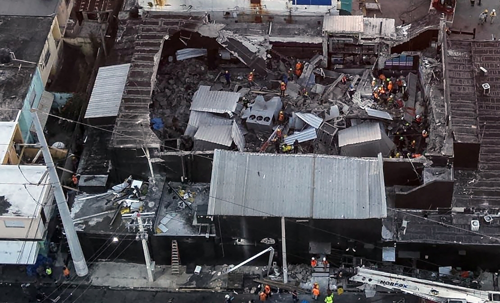 Photo shows an aerial view of the Jet Set nightclub after the collapse of its roof, in Santo Domingo, on April 8, 2025. (Photo by Handout / Prensa Servicio 911 / AFP)