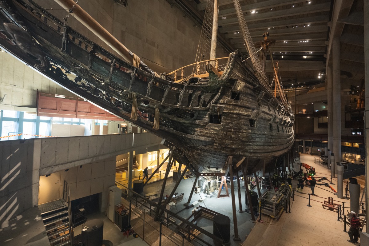 Workers install a new metallic support structure for the 17th-century warship Vasa at the Vasa Museum in Stockholm, Sweden, on April 8, 2025. Photo by Jonathan NACKSTRAND / AFP
