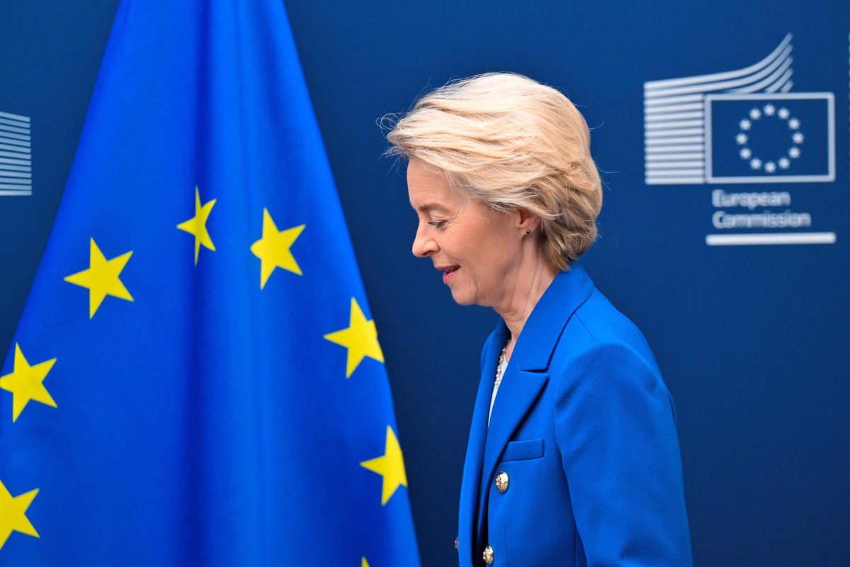 European Commission President Ursula von der Leyen walkss prior to a meeting with Iceland Prime Minister at the EU Commission headquarters in Brussels on April 9, 2025. (Photo by Nicolas TUCAT / AFP)