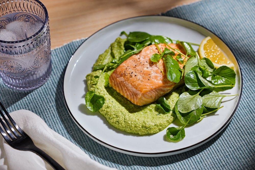 Roasted salmon with whipped feta and peas. (Photo by Tom McCorkle for The Washington Post/food styling by Gina Nistico for The Washington Post)

