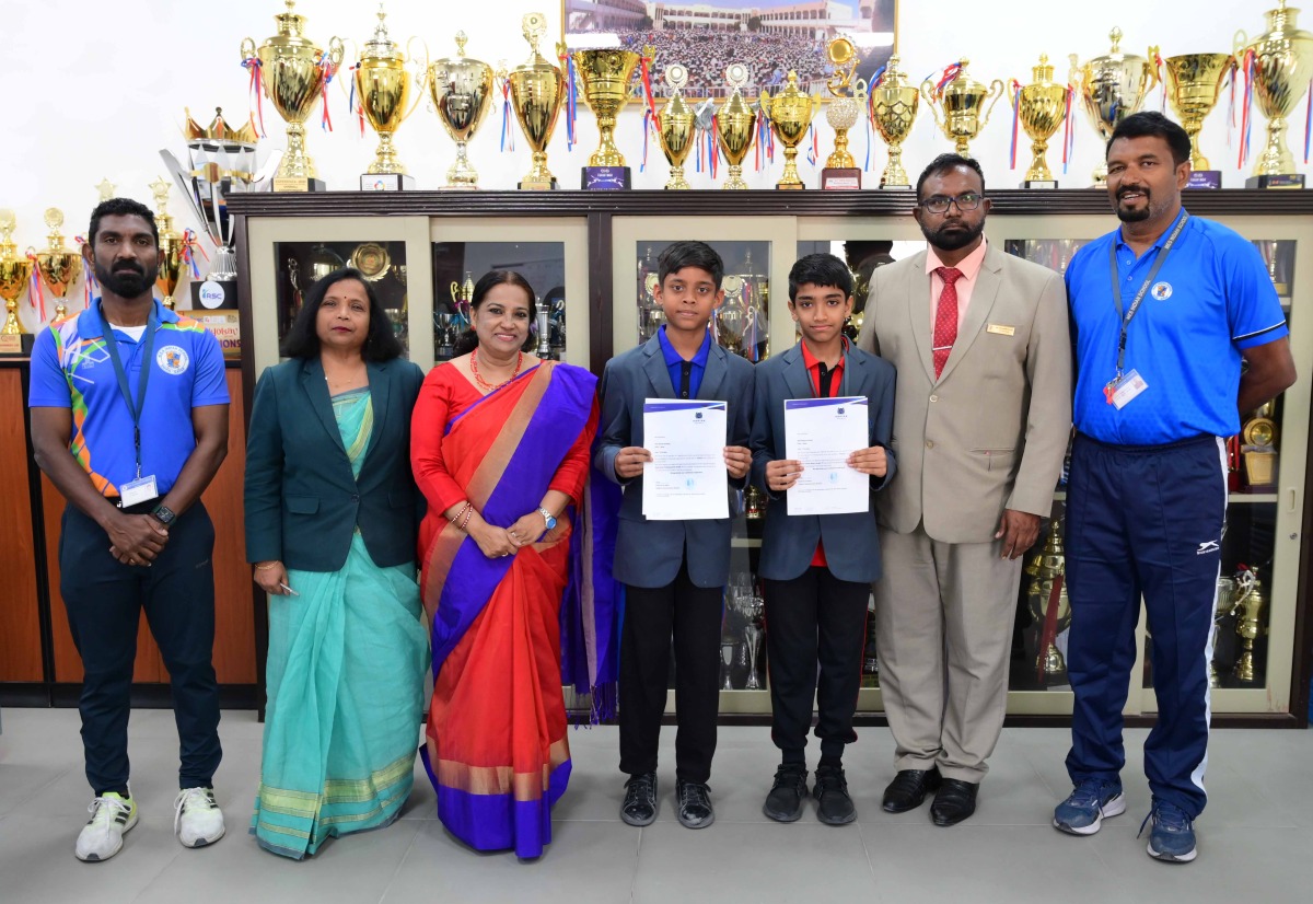 MES students with school officials.