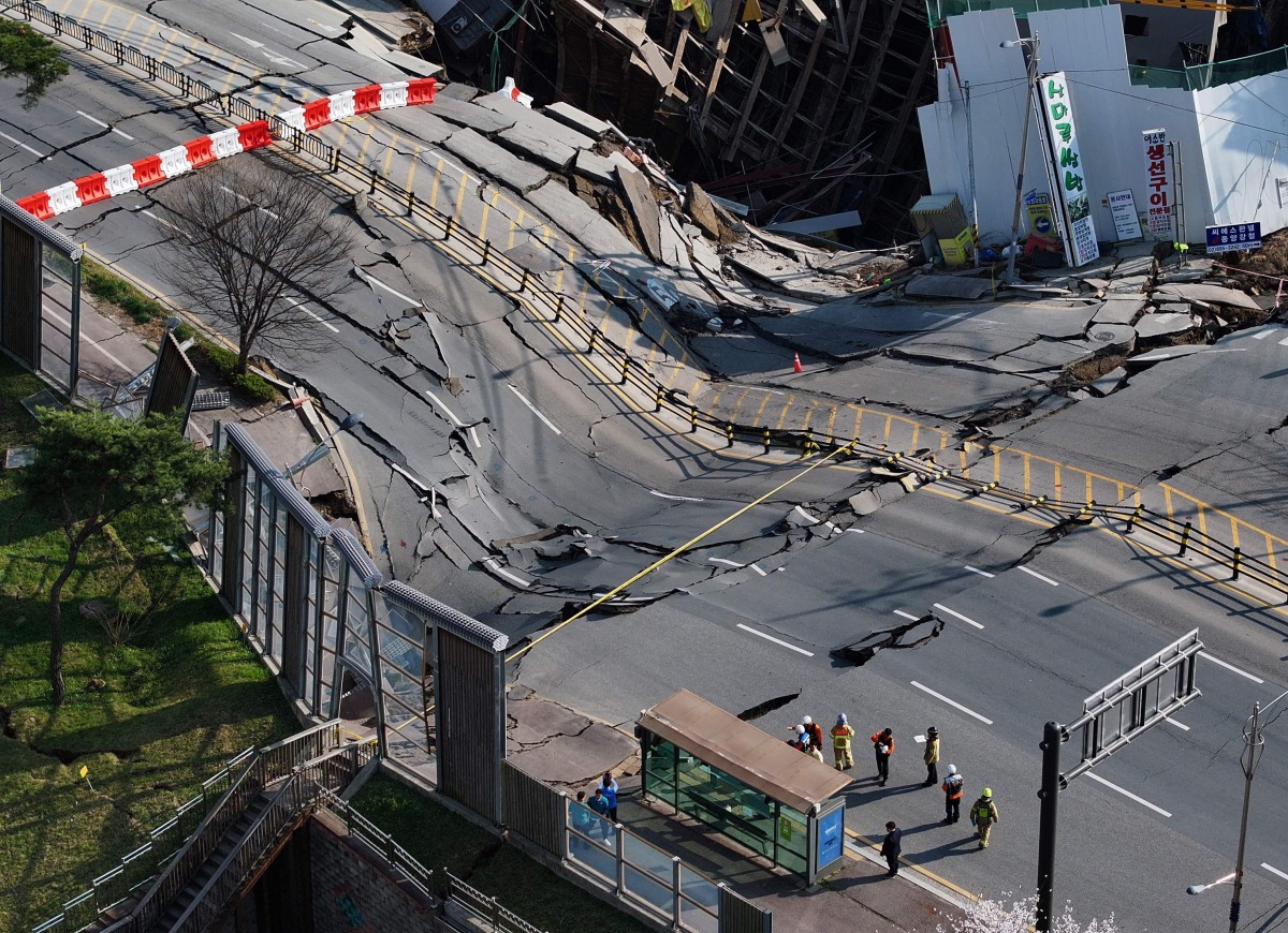 A general view shows the site of a collapsed construction site in Gwangmyeong, southwest of Seoul on April 11, 2025, which was part of an underground transit project connecting Seoul's Yeouido district to Ansan and Siheung in Gyeonggi province, the country's most populous region. (Photo by YONHAP / AFP)