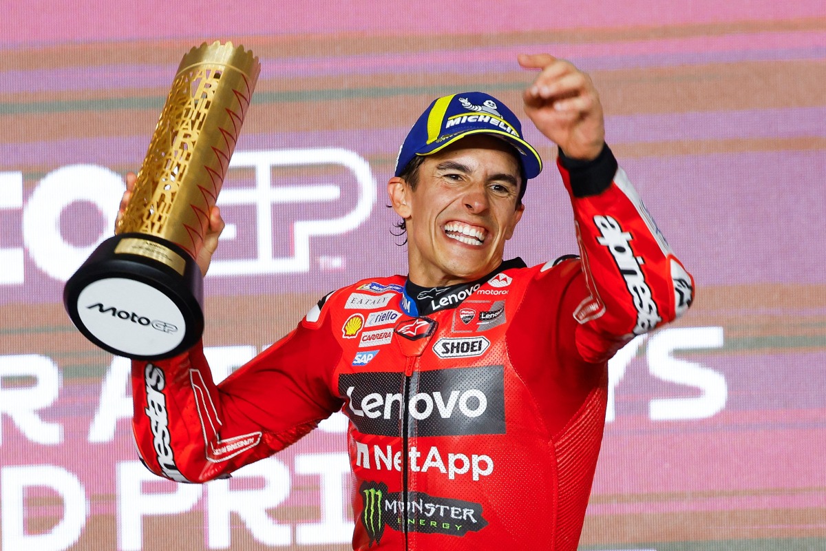 Ducati Lenovo’s Marc Marquez celebrates with the trophy after winning the MotoGP Qatar Grand Prix. PICTURES: AFP/LIC 