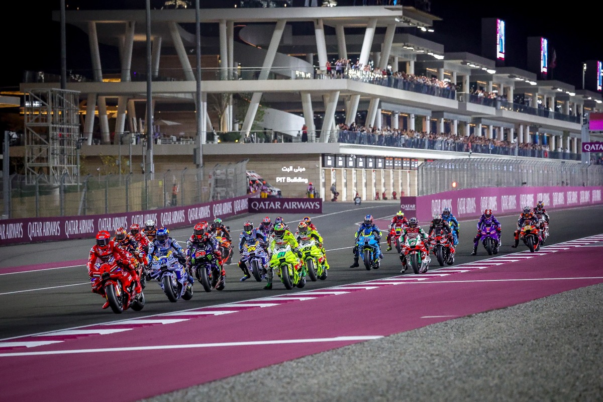 Riders compete during the MotoGP Qatar Grand Prix at the Lusail International Circuit yesterday.