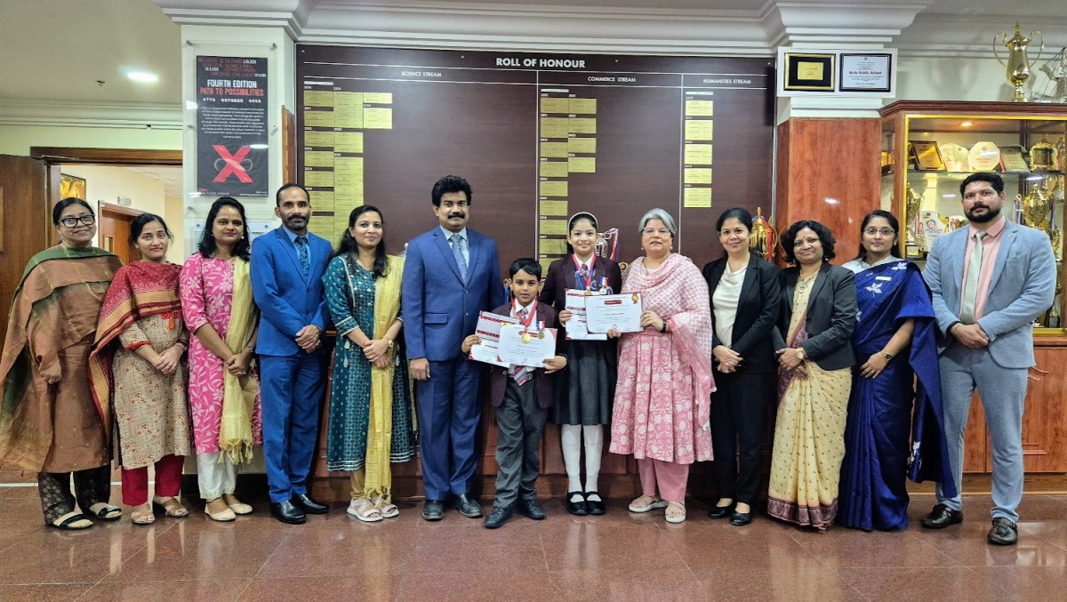 Prize winning students with school officials.