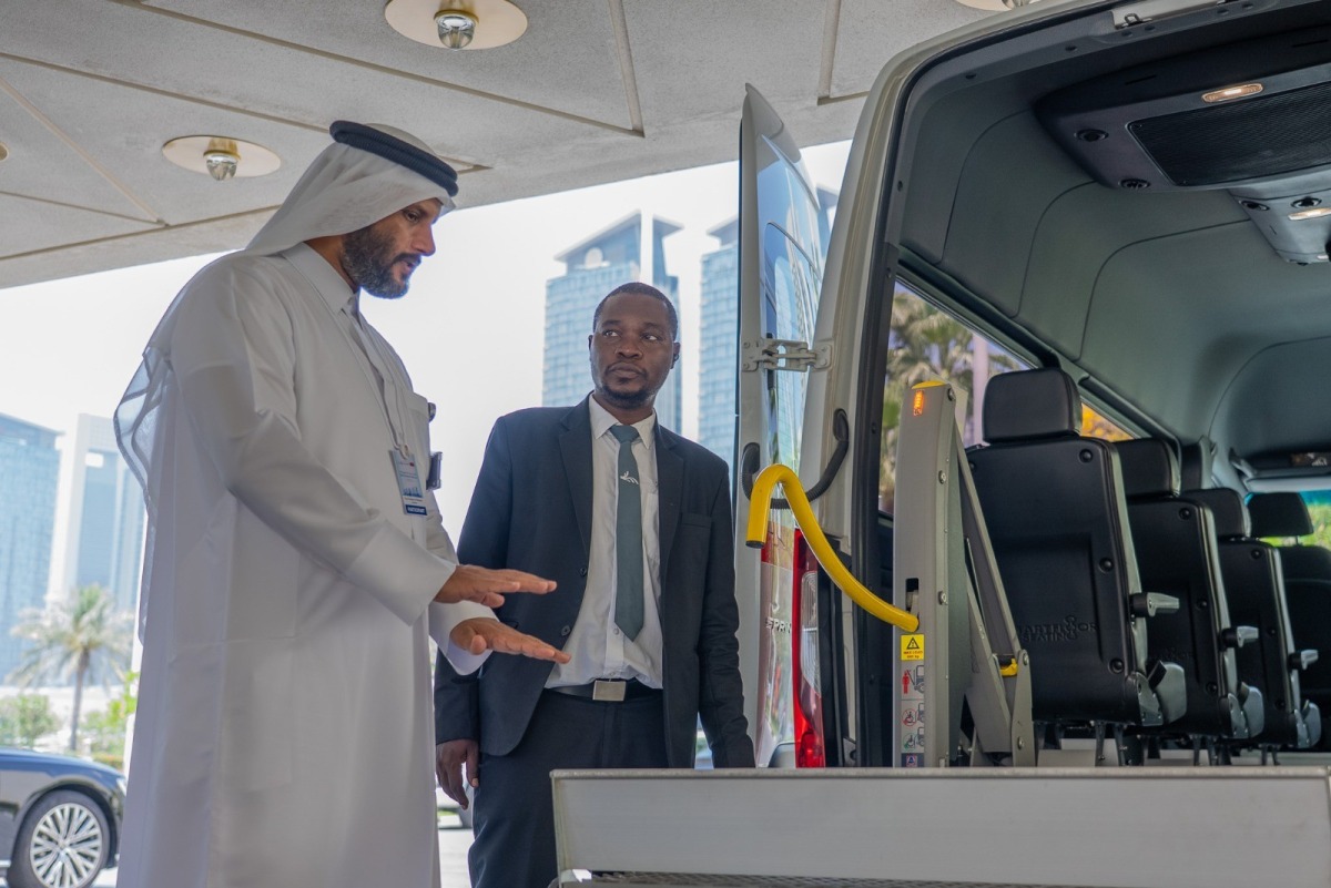 A Mowasalat official with one of the vehicles.