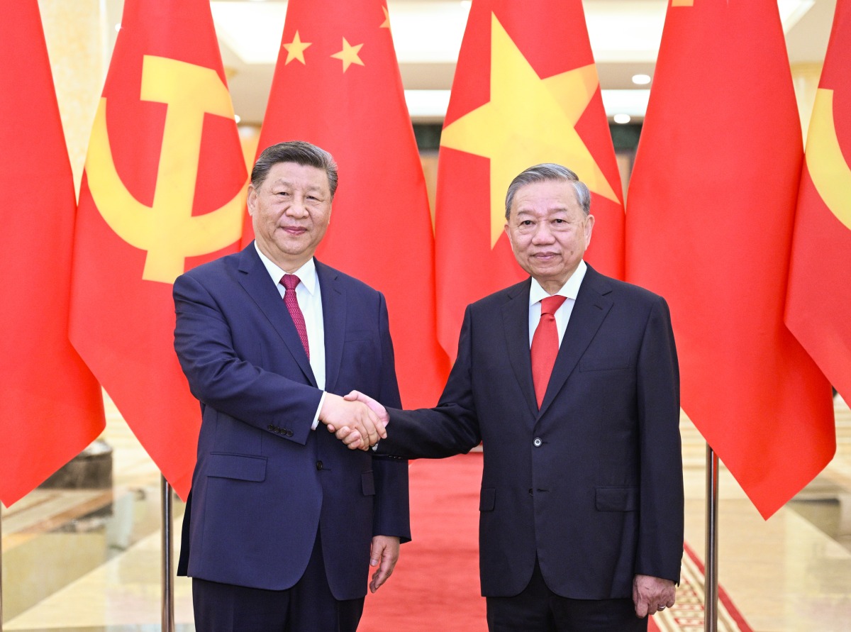 Xi Jinping, general secretary of the Communist Party of China Central Committee and Chinese president, holds talks with To Lam, general secretary of the Communist Party of Vietnam (CPV) Central Committee, at the CPV Central Committee headquarters in Hanoi, Vietnam, April 14, 2025. (Xinhua/Li Xueren)
