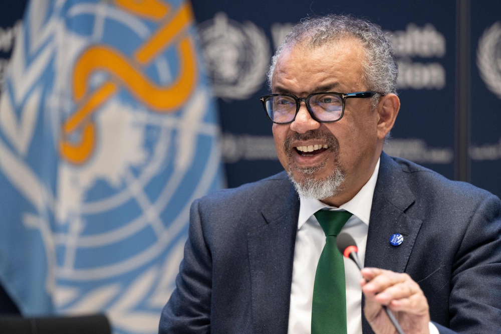 A handout photograph by the World Health Organisation (WHO) shows WHO Director-General Tedros Adhanom Ghebreyesus smiling after a consensus on the Pandemic Agreement at the WHO headquarters. (Photo by Christopher Black / WHO / AFP)